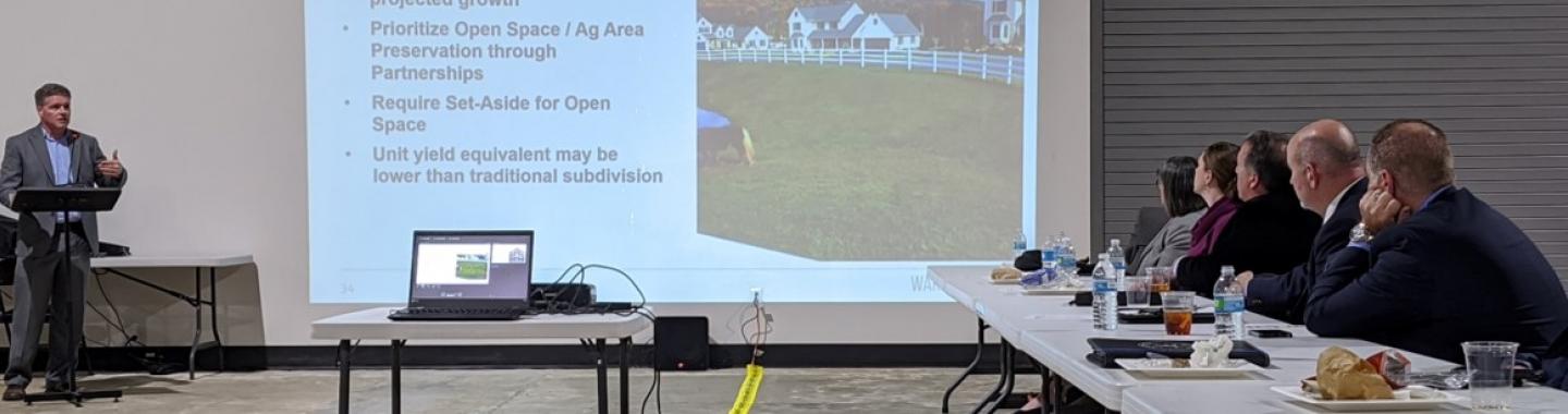staff give a presentation about planning for growth