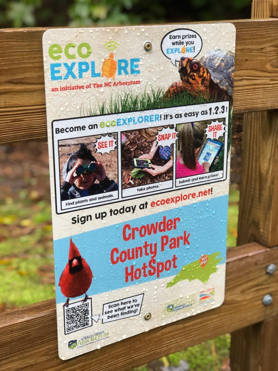 image of eco-explore sign on wooden fence posts