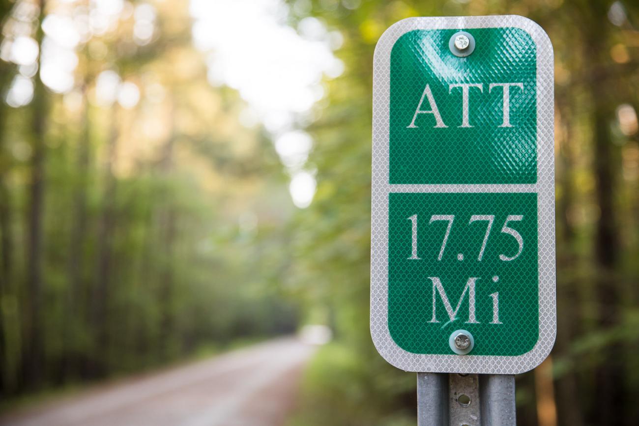 Photo of one of the mile marker signs located on the American Tobacco Trail