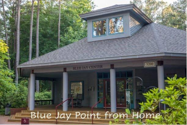 View of the front of the Blue Jay Center for Environmental Education with the words "Blue Jay Point from Home" superimposed at the bottom.