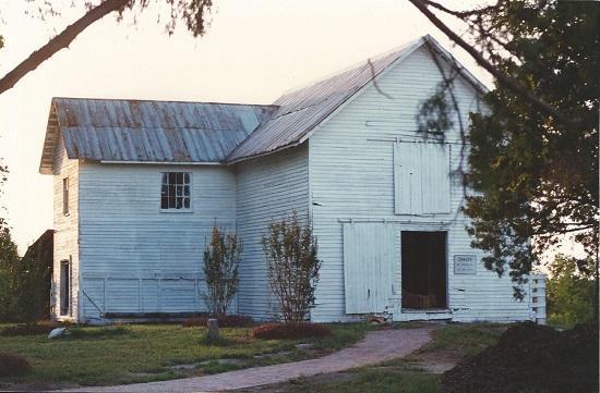 View of the Cotton Gin House before restoration in the 1990s
