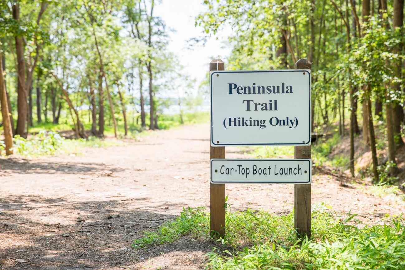Photo of the sign showing location of the Car Top Boat Launch in the park (at the start of the Peninsula Trail)