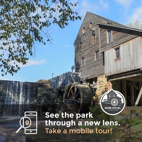 mobile tour advertisement with mill building in background