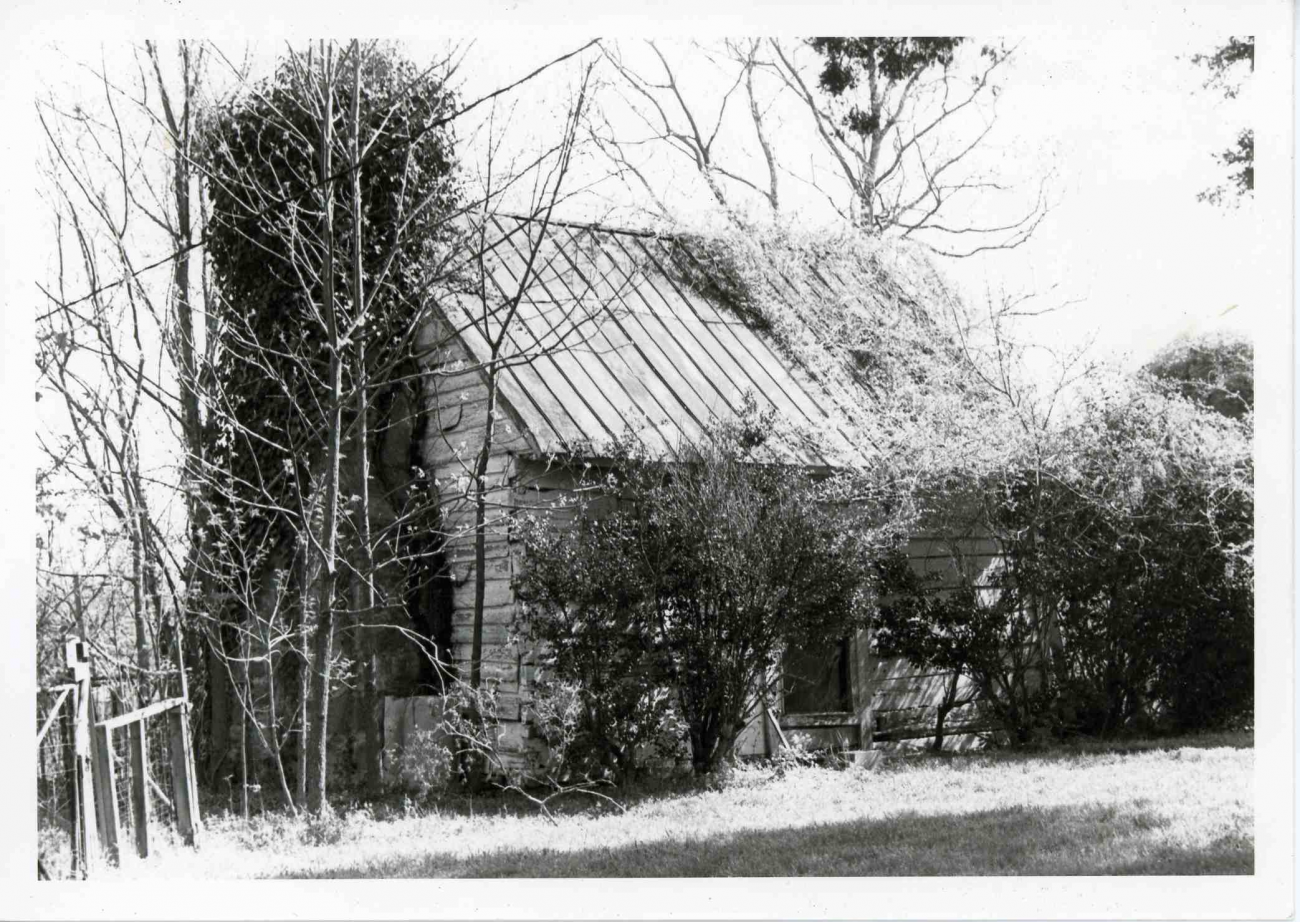 Black and white image of the detached kitchen before restoration