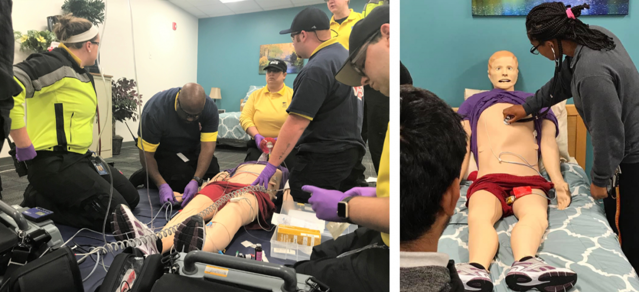 Paramedics working through simulated patient care on a manikin