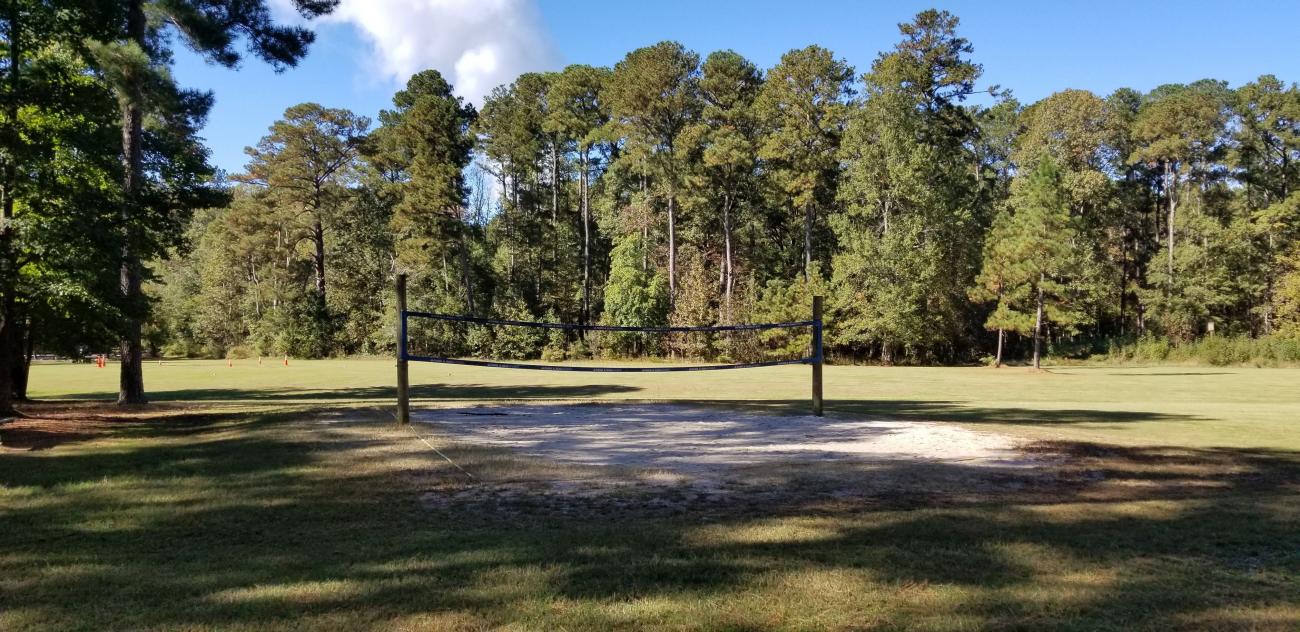 View of the sand volleyball court and open play field