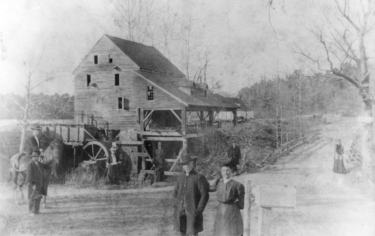 old black and white photo of historic mill from 1890