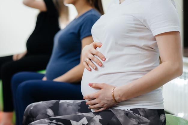 3 pregnant mother sitting down