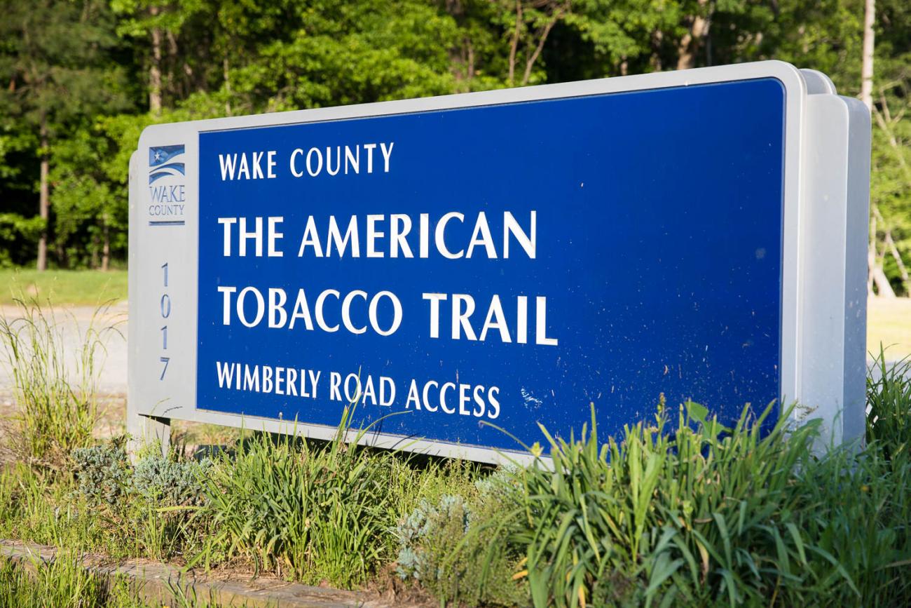 A photo of the sign located at the Wimberly Road parking area on the American Tobacco Trail