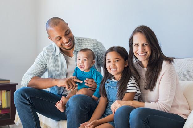 Family sitting on the sofa