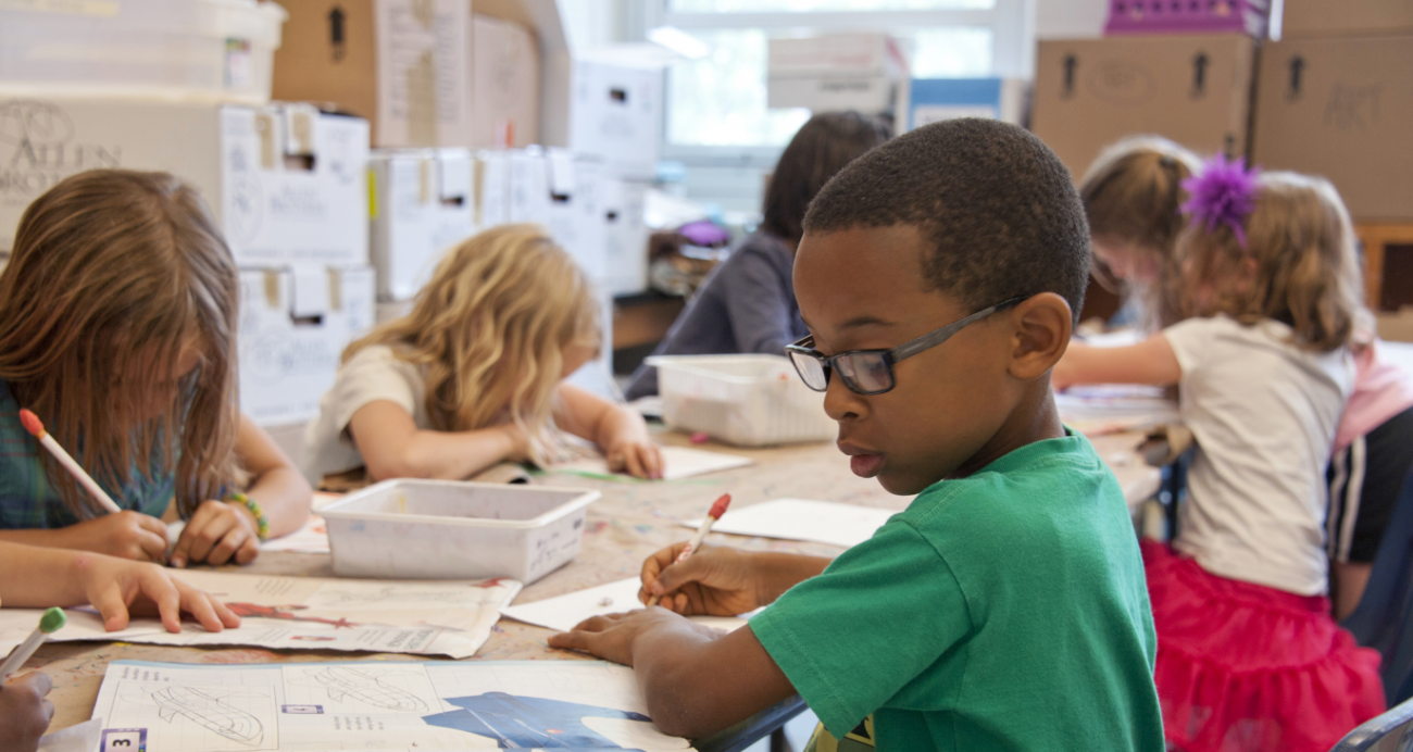 Young children doing activities in a classroom