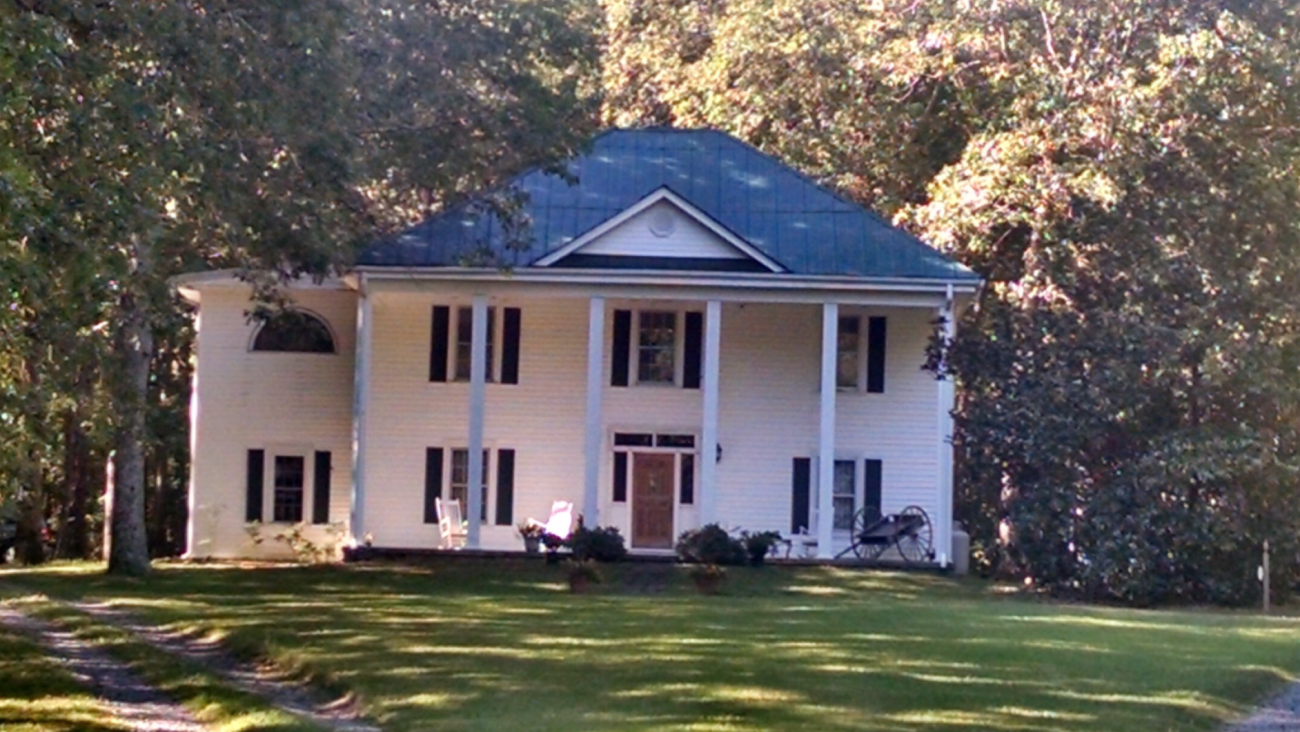 Photo of the Holleman Family home which was located in what is now the Educational Garden at Harris Lake County Park