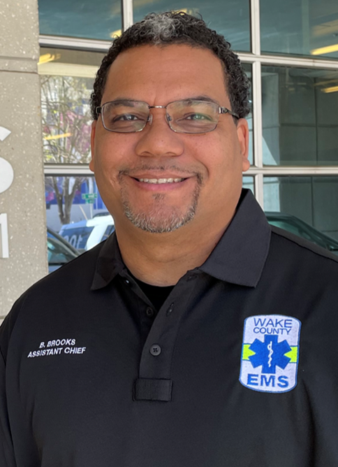 Brian in front of EMS station