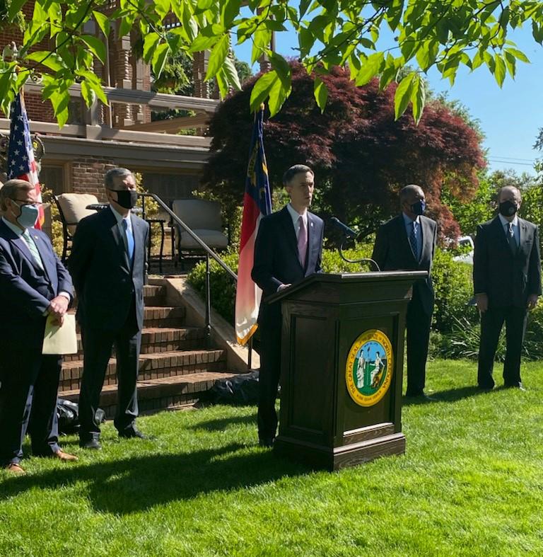 Commissioners' Chair Matt Calabria speaks during a news conference announcing Apple's new North Carolina campus