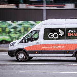 Go Wake van driving down street