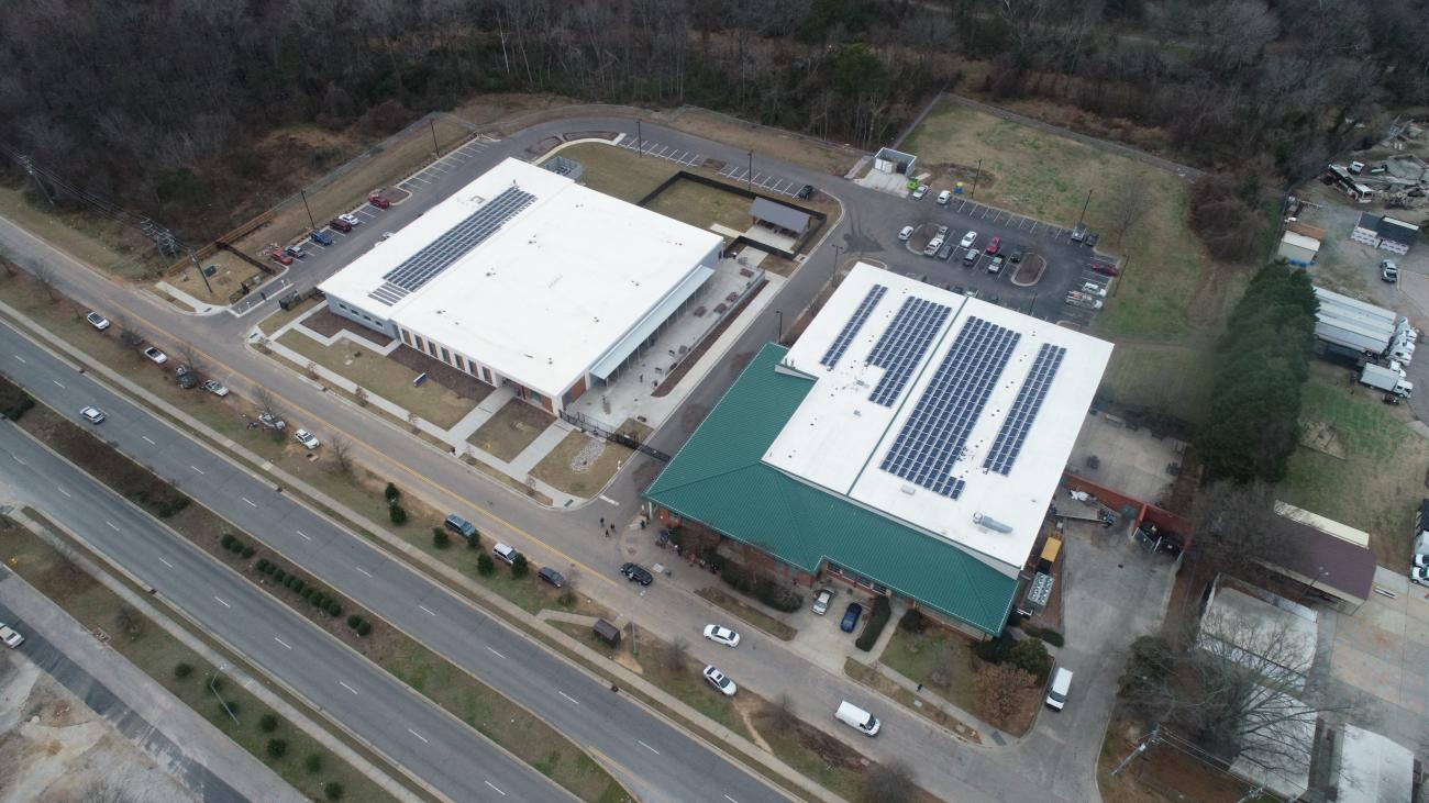 Aerial view of solar panels on the roofs of Oak City and South Wilmington Street centers