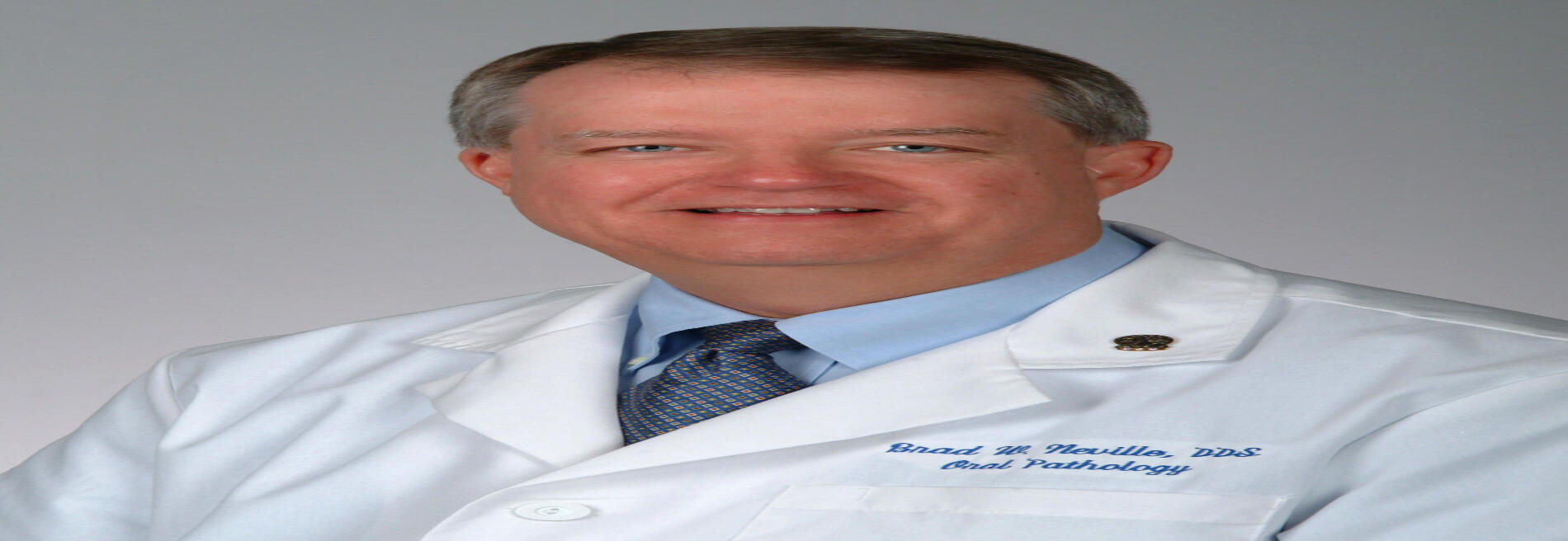 Brad W. Neville, DDS