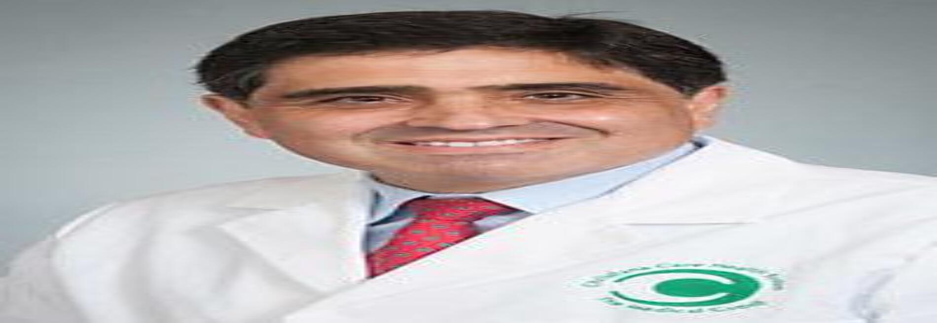 Carlos E. Reyes, MD