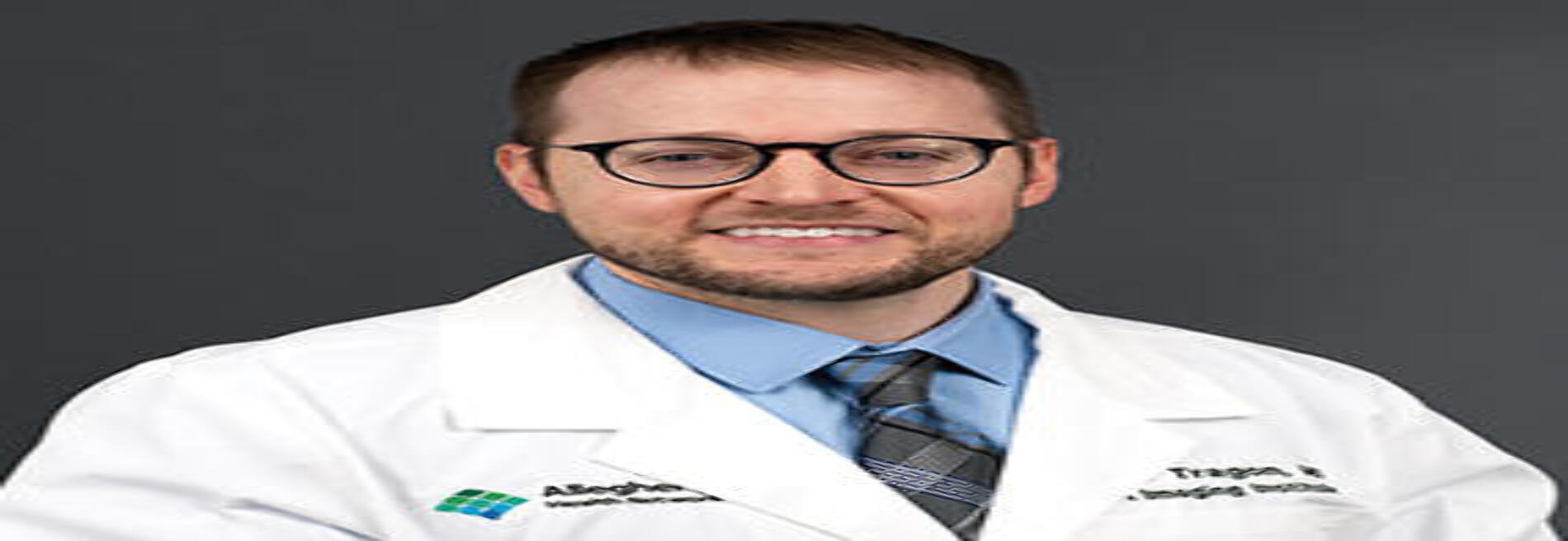 Tyson R Tragon, MD