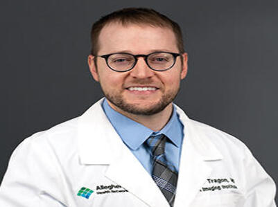 Tyson R Tragon, MD