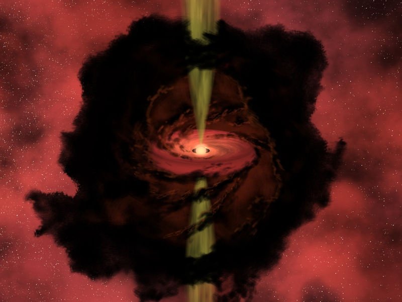 Artist's rendition of a protostar. The protostar is bright in the center, surrounded by a swirling disk of gas and dust, called a protostellar disk. Two jets of gas can be seen flowing out along the rotation axis of the protostar.