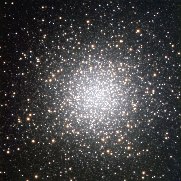 M3 globular cluster. A high concentration of stars in the center and decreasing in density further out. The center is bright.
